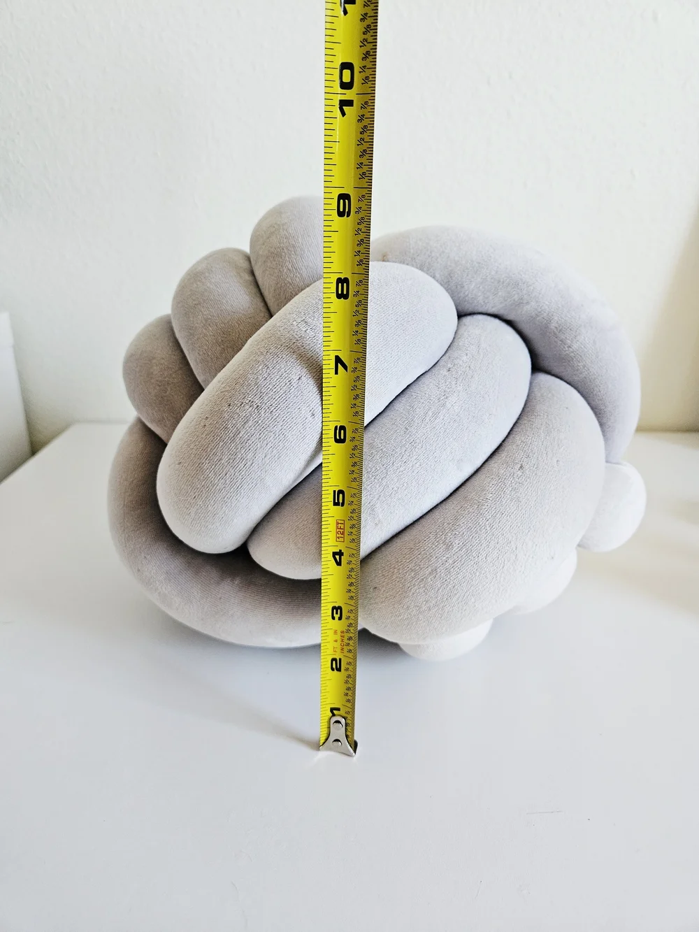 Plush Knot Throw Pillow in Light Gray